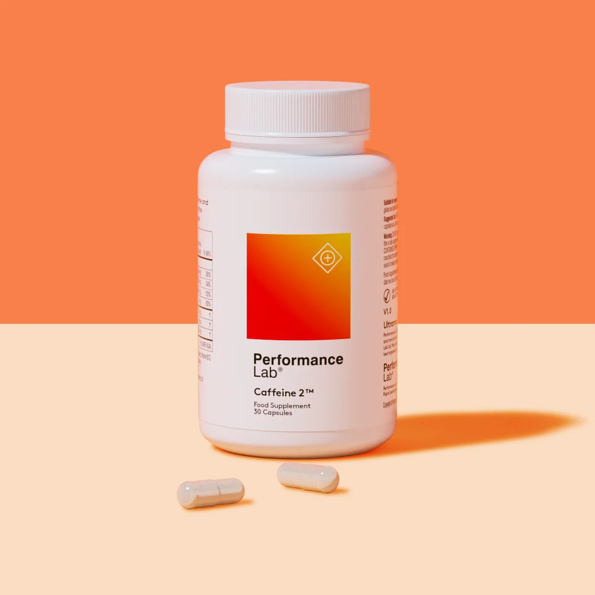 Performance Lab Caffeine 2 supplement bottle with two capsules.